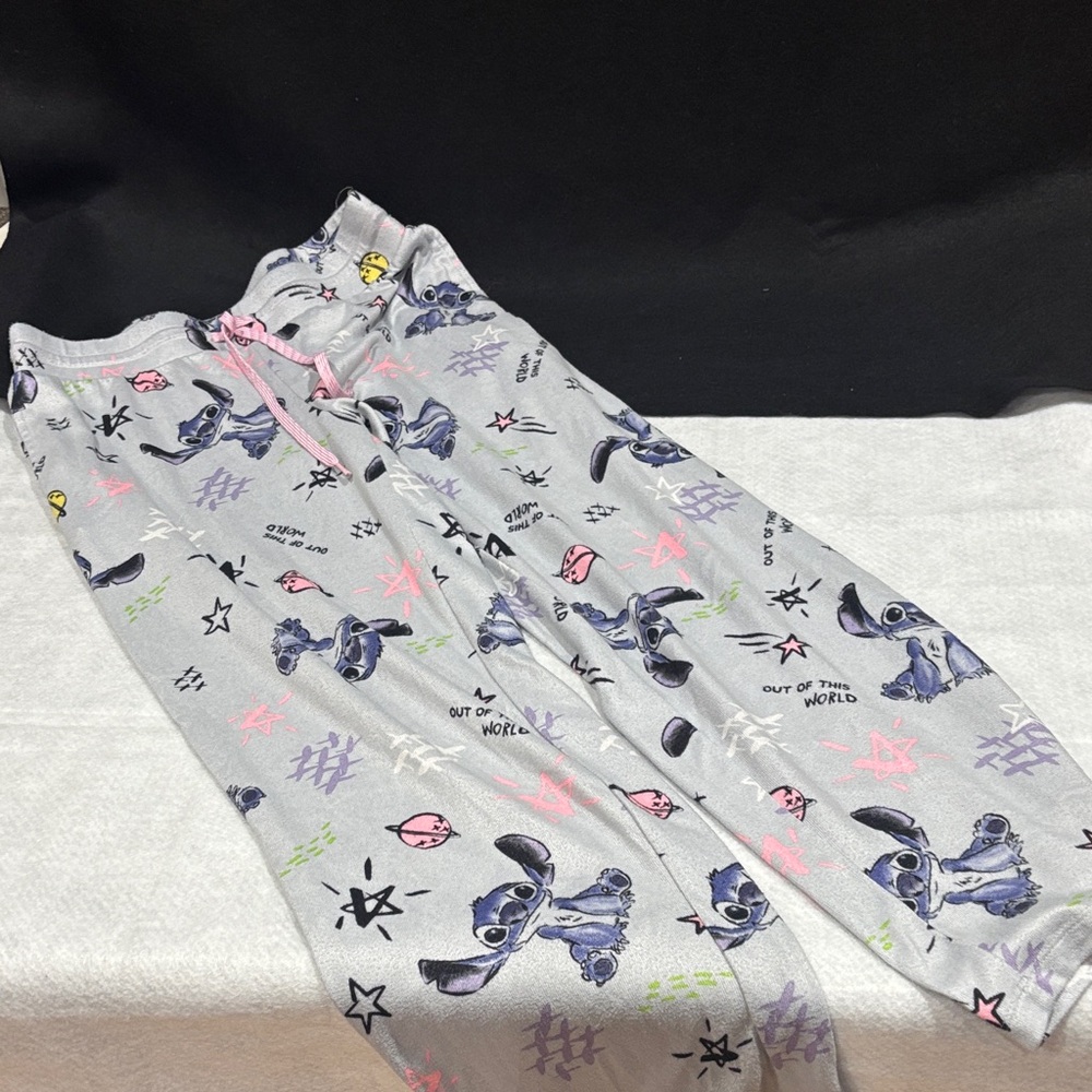 Disney Gray Pajama Pants with Stitch Print and Front Pockets.